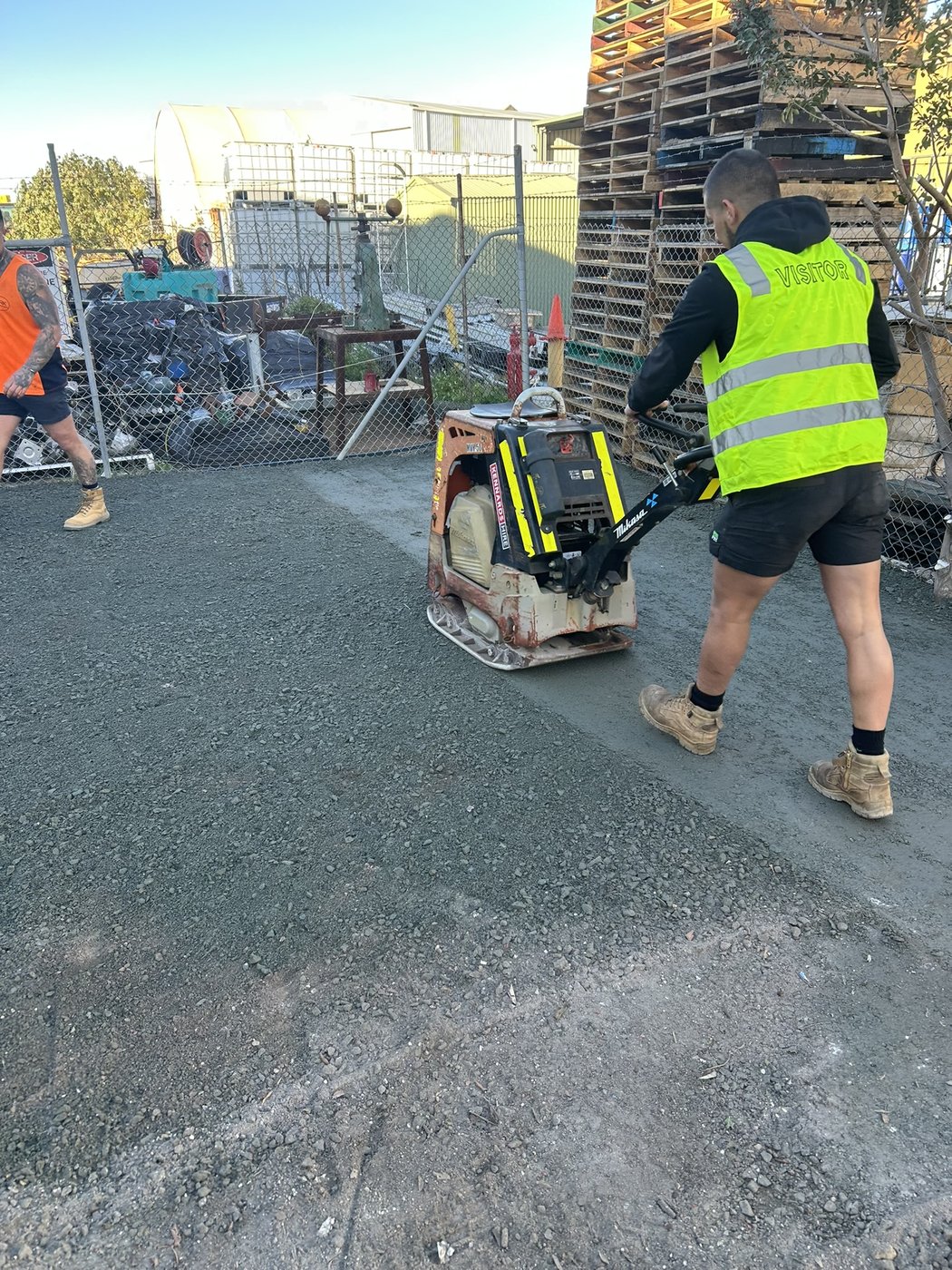 Plate compaction of gravel surface